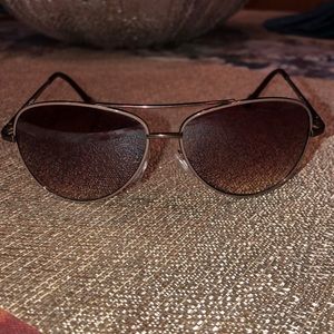 Jessica Simpson aviator sunglasses.